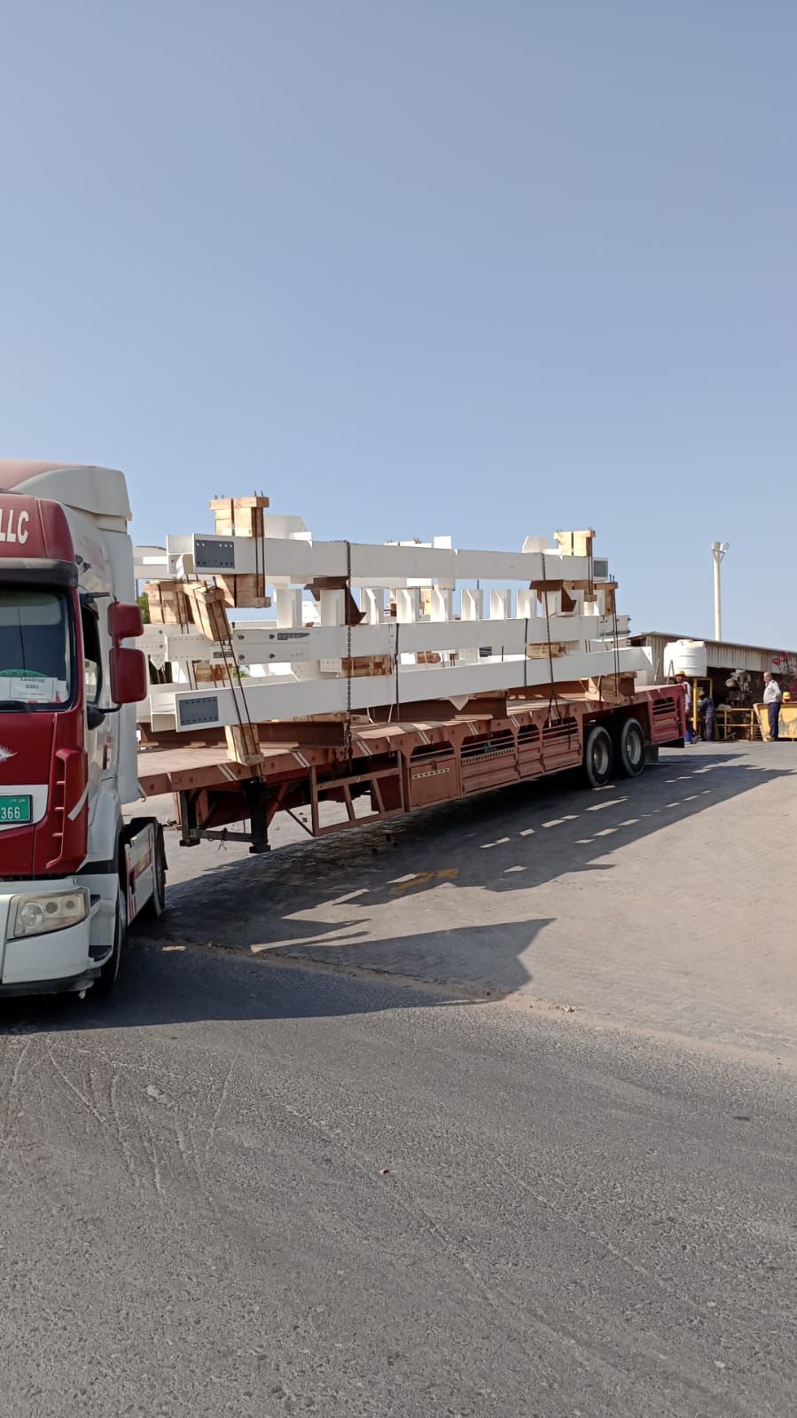 Flatbed trucks transporting cargo